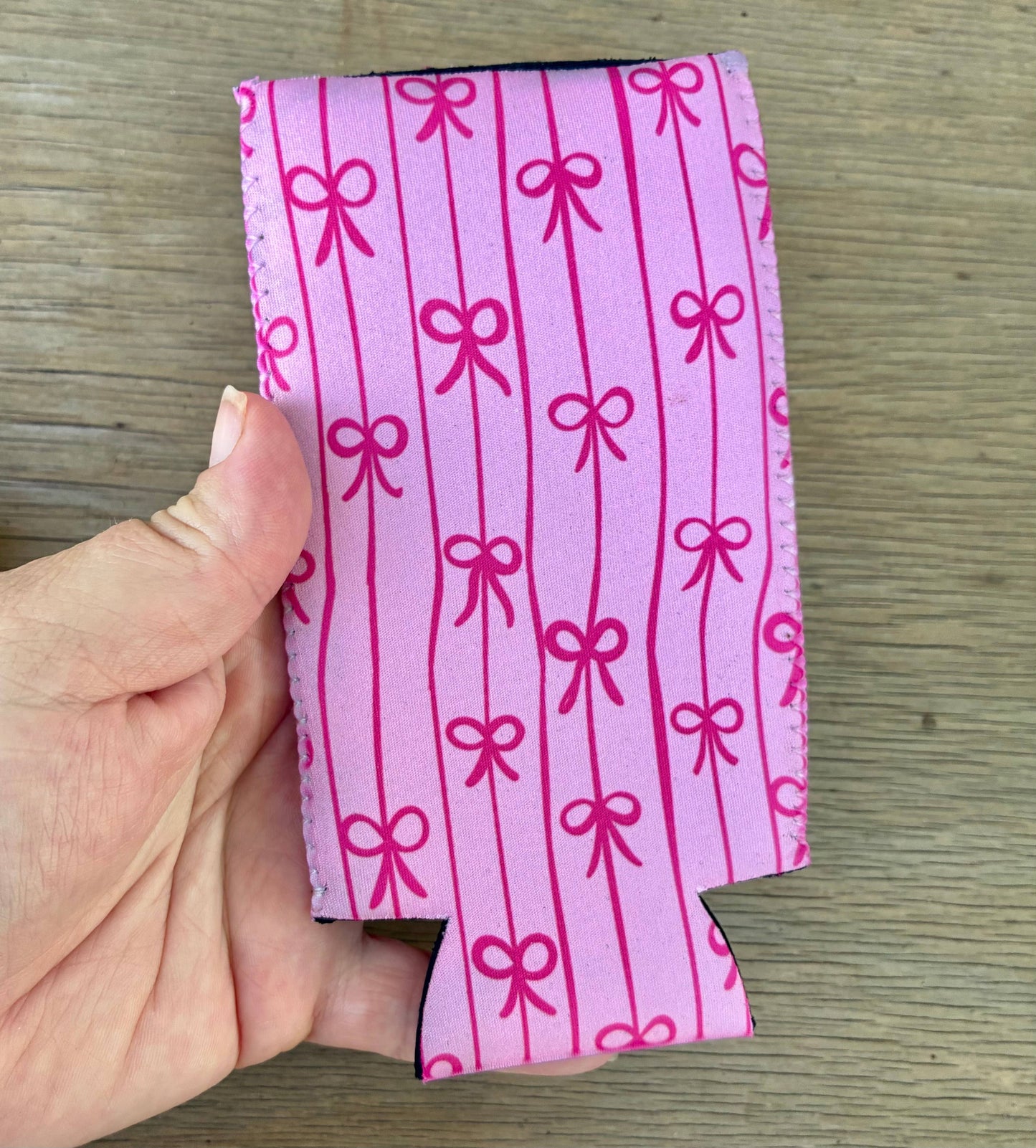 Pink bow can koozies